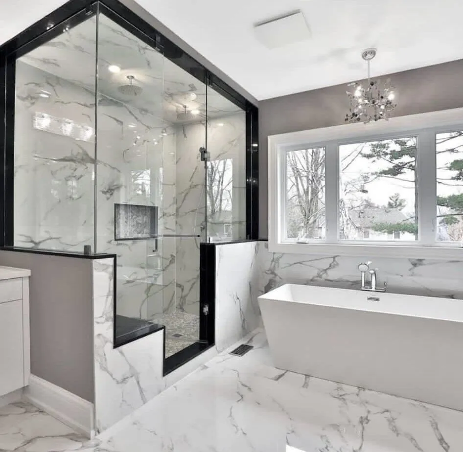 Bathroom renovation completed by A1 Handyman in Miami with new porcelain tile, vanity, and modern fixtures